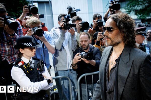 Russell Brand pleads not guilty to rape and assault