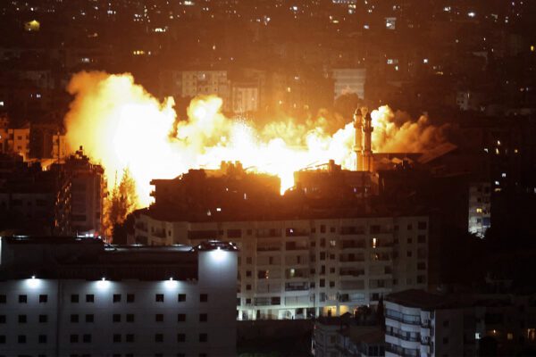 Israel attacks Beirut suburbs on eve of Eid